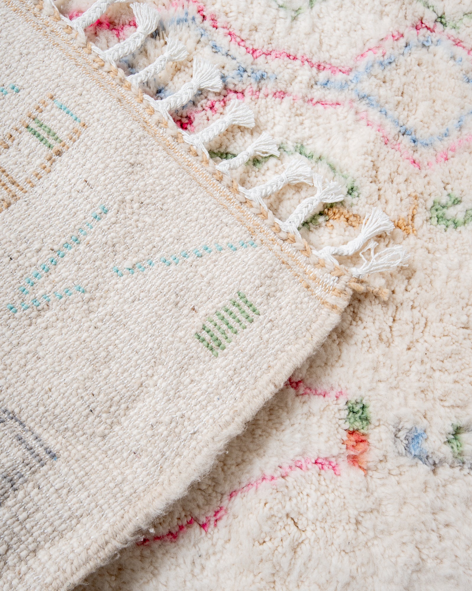 Modern, designer, handcrafted Berber rug from Morocco. Beniourain carpet with beautiful colours and patterns and fluffy wool texture.